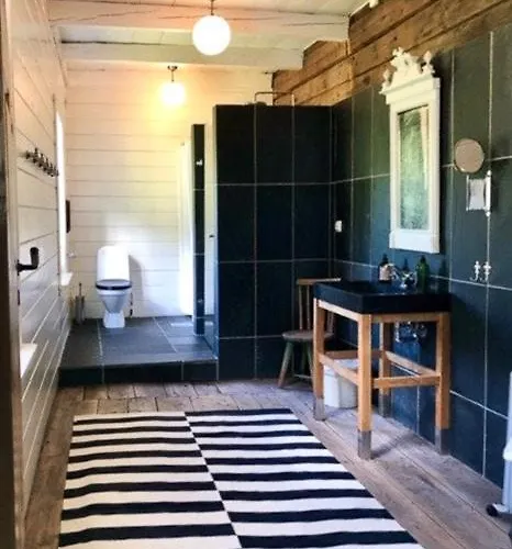 Historic Timber House From The 1800s In Nordfjord Olden